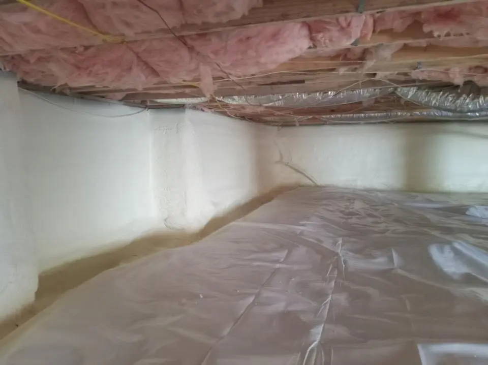 Crawl space encapsulation with closed-cell spray foam for Storm Damage Roof Repair in Huntington
